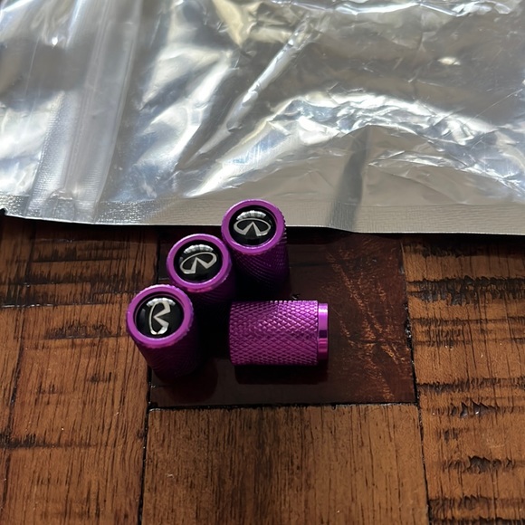 Accessories - 3/$10 NEW purple infiniti tire valve caps
